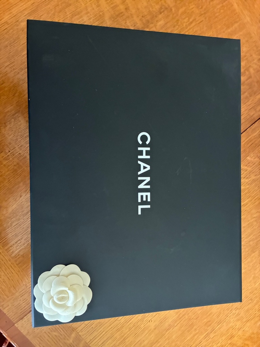 CHANEL Black Box with White Camellia Accent